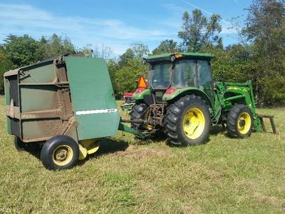 tractor with hay baling attachment