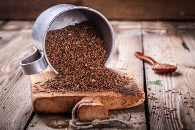 flaxseeds on a table with a spoon