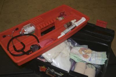 vet first aid kit in a toolbox