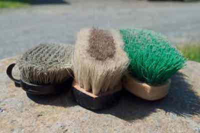 three brushes finishing brush and soft brush and stiff brush