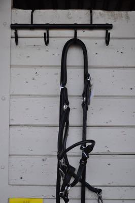 bridle on hooks at a horse show
