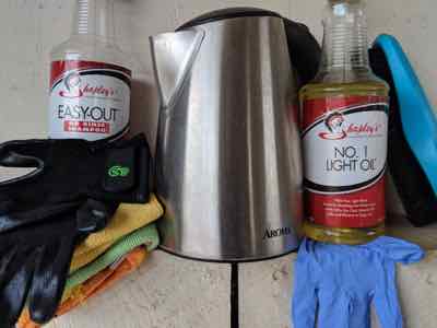 hot water kettle and horse grooming sprays with cloths