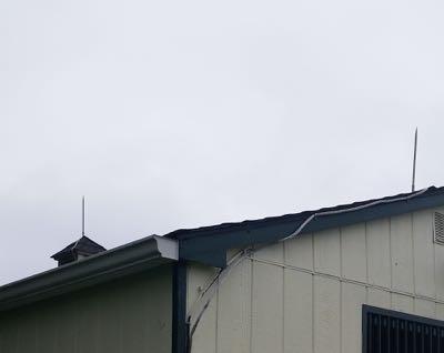 barn with two lightning rogds