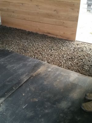 large gravel under stall mats for drainage