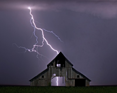 barn with lightning striking