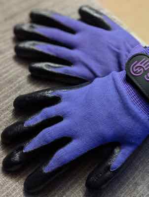 hands on grooming gloves in purple