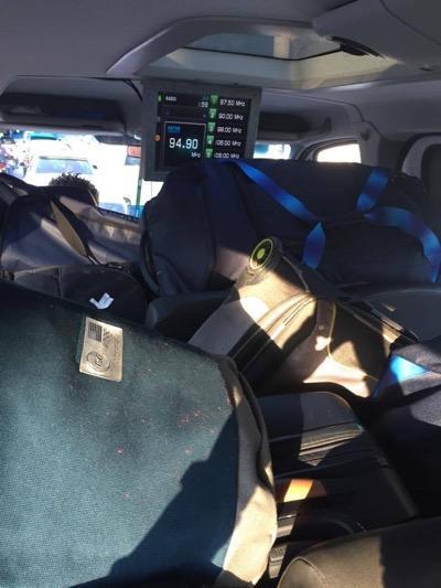 bags and luggage packed into a car