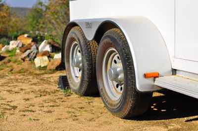 horse trailer tires on dusty ground