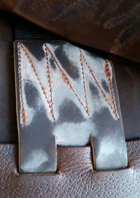 mold and mildew on a saddle stirrup leather flap